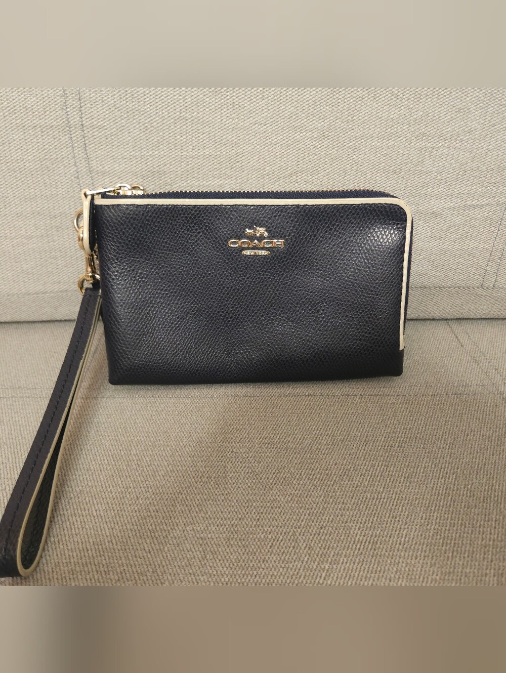 Coach Corner Navy Blue Pebbled Leather Zip Wristlet with White Trim